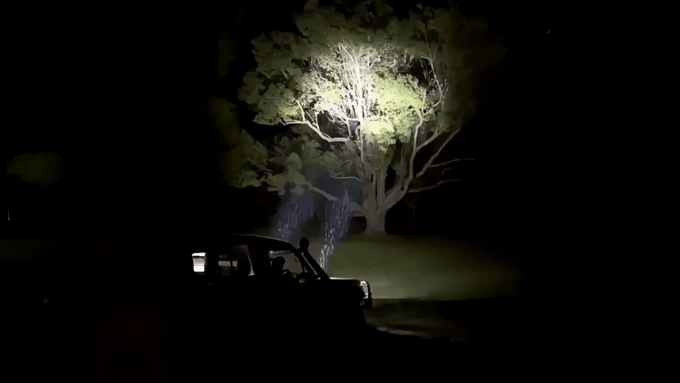 Demonstration of a vehicle-mounted spotlight changing direction at night
