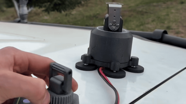 Handheld remote controlling the pan and tilt movement of a PivotX platform